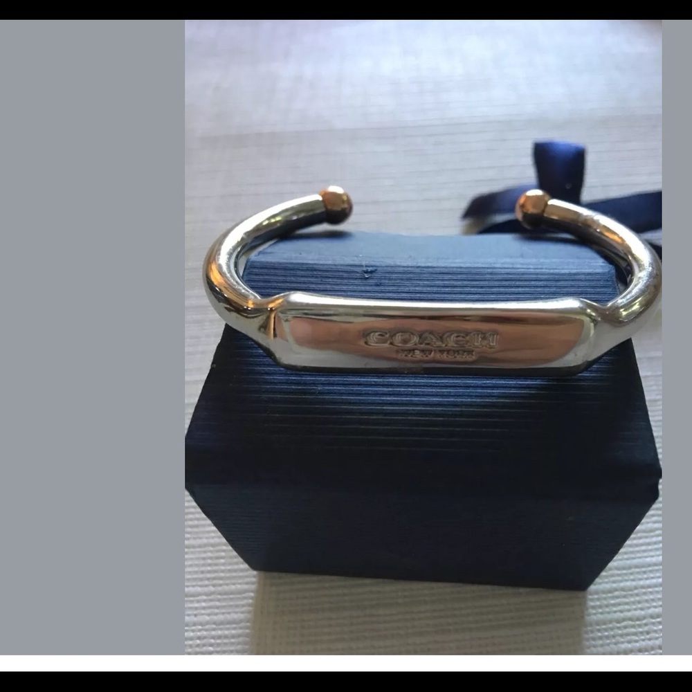 COACH Women’s silver open bangle
